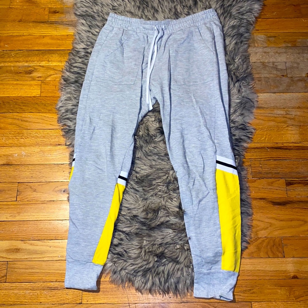 Gray and yellow sweatpants